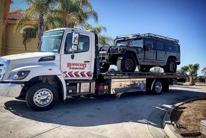 Flatbed towing a H1 Hummer in Temecula - Rancho Towing