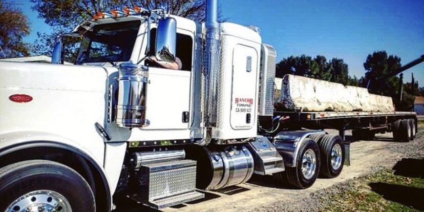 Heavy Duty Flatbed Towing Truck towing cement barriers in Temecula CA – Rancho Towing IMG_6353 Heavy Duty Flatbed Towing Truck towing cement barriers in Temecula CA - Rancho Towing